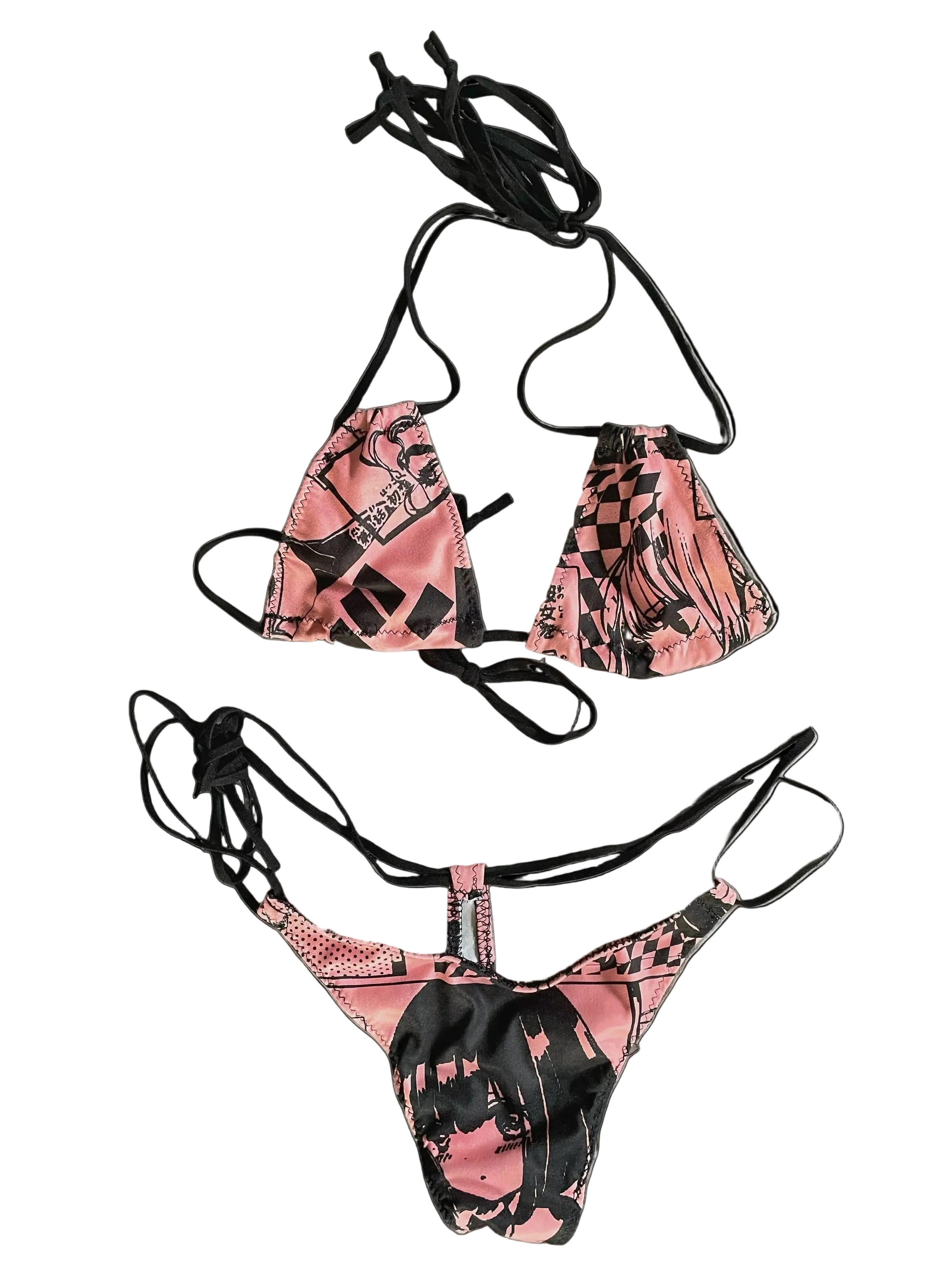 Pink and black anime patterned bikini set on a white background