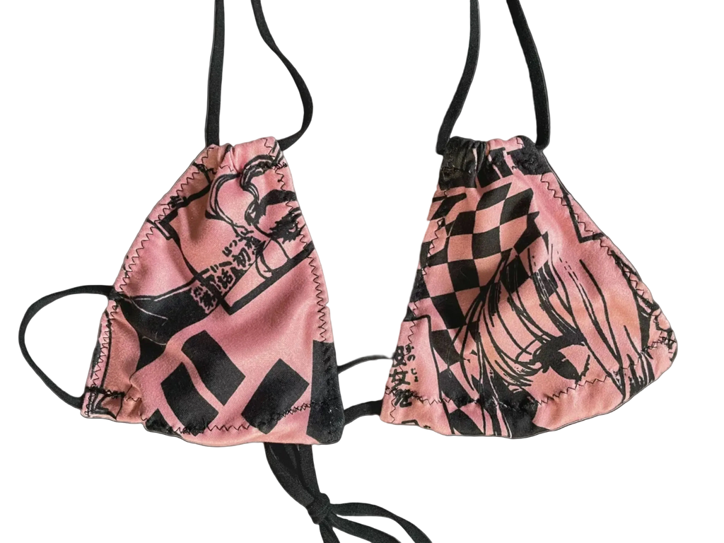 pink and black anime patterned micro bikini top with thin black strings