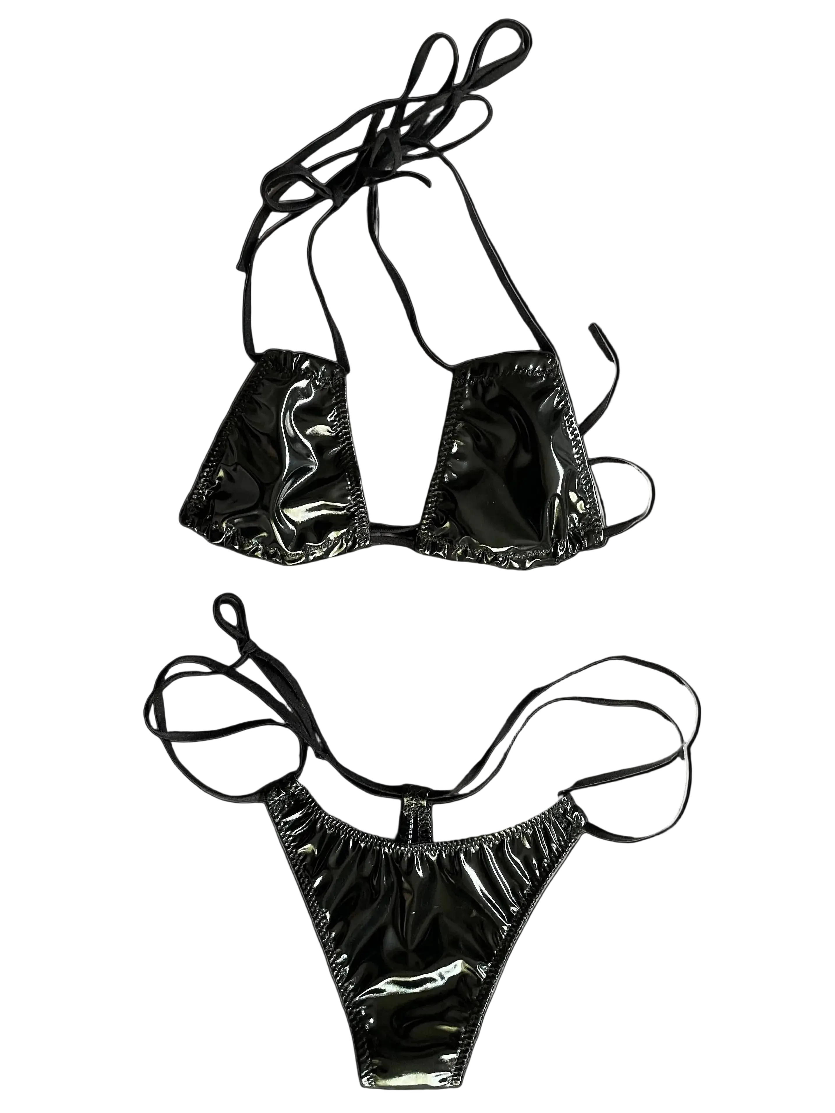 Black bikini set with wet look on a white background