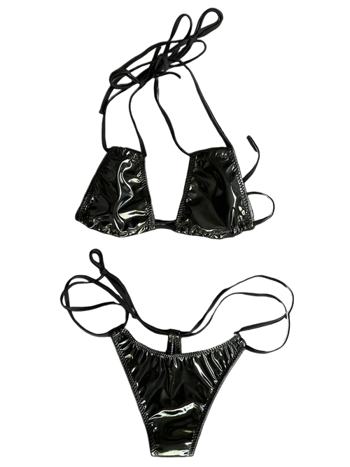 Black bikini set with wet look on a white background