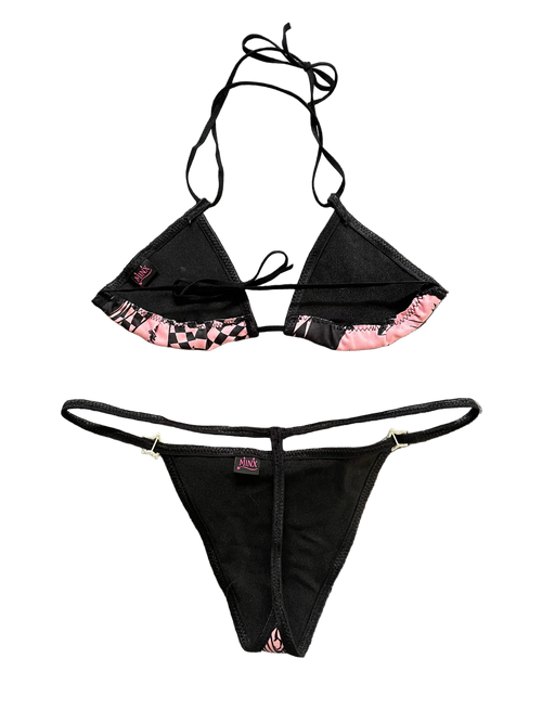 Backside of pink with black graphics thong bikini