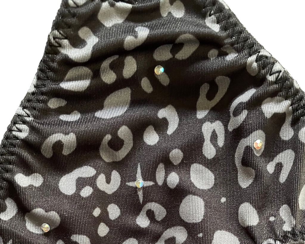 Closeup of bikini top with rhinestone accents