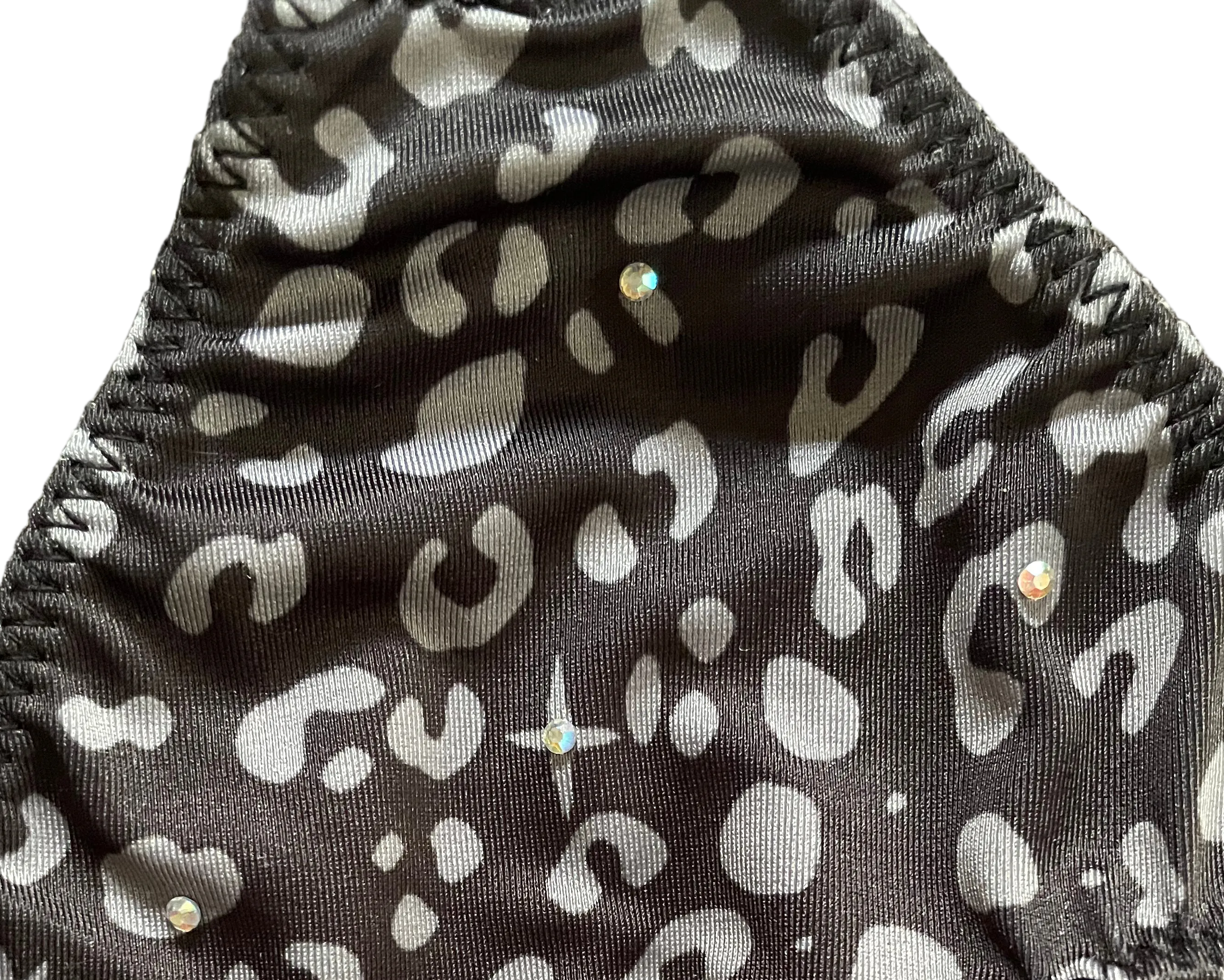 Closeup of bikini top with rhinestone accents